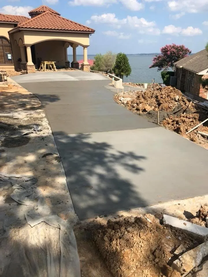 Trusted lawn mowing service with custom design in Cleveland, TX by Specialty Tractor And Landscaping Services