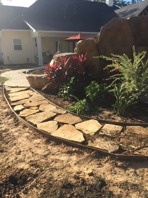 Affordable yard cleanup service with custom design in Cleveland, TX by Specialty Tractor And Landscaping Services