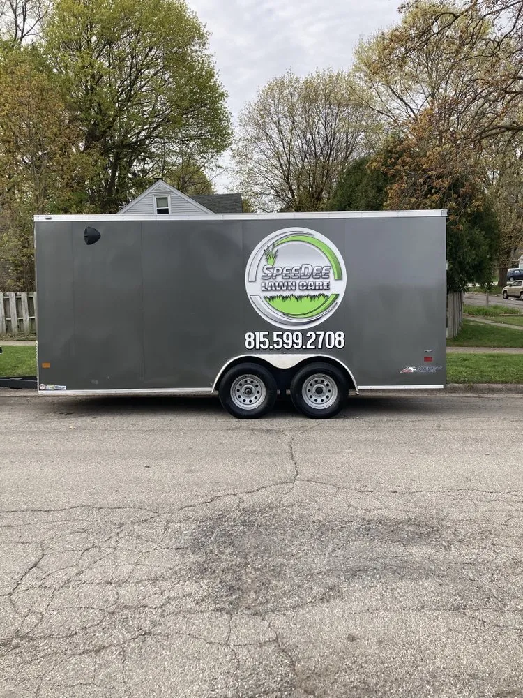 Custom residential landscaping for year-round maintenance in Rockford, IL by SpeeDee Lawn Care & Snow Removal