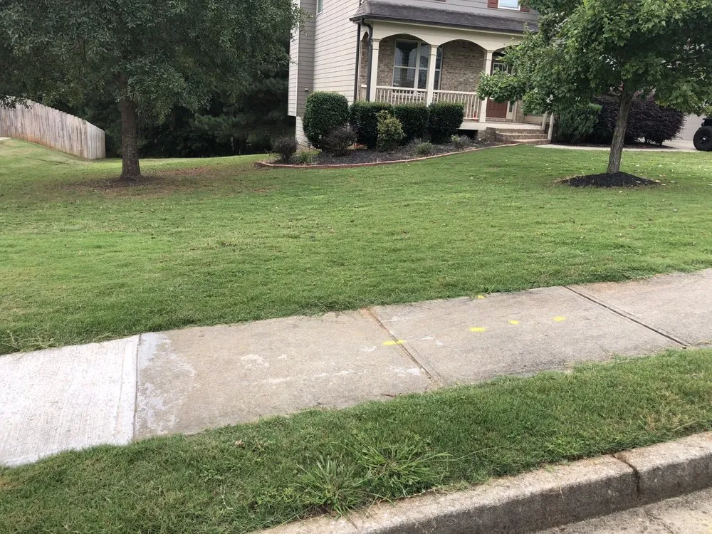Professional lawn mowing service for residential properties in Rockford, IL by SpeeDee Lawn Care & Snow Removal