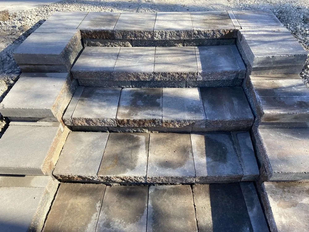 Professional lawn mowing service with custom design in Holts Summit, MO by Speedy Landscaping