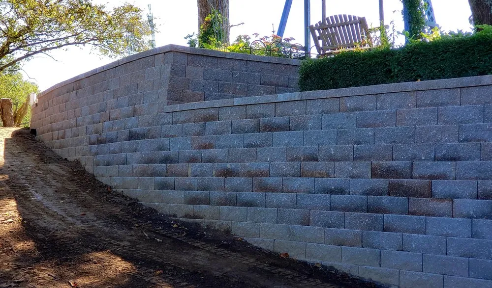 Trusted landscape installation for residential properties in Kansas City, MO by SpeedyBlades Contracting & Design