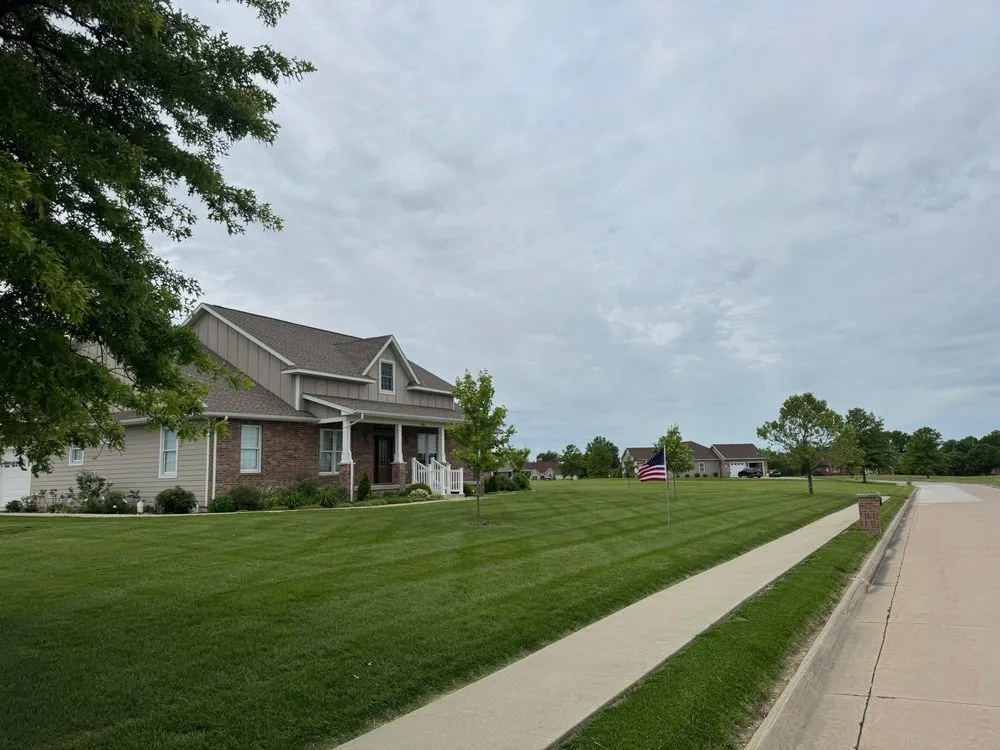 Expert yard cleanup service with custom design in Kirksville, MO by Spencer Lawn And Landscape