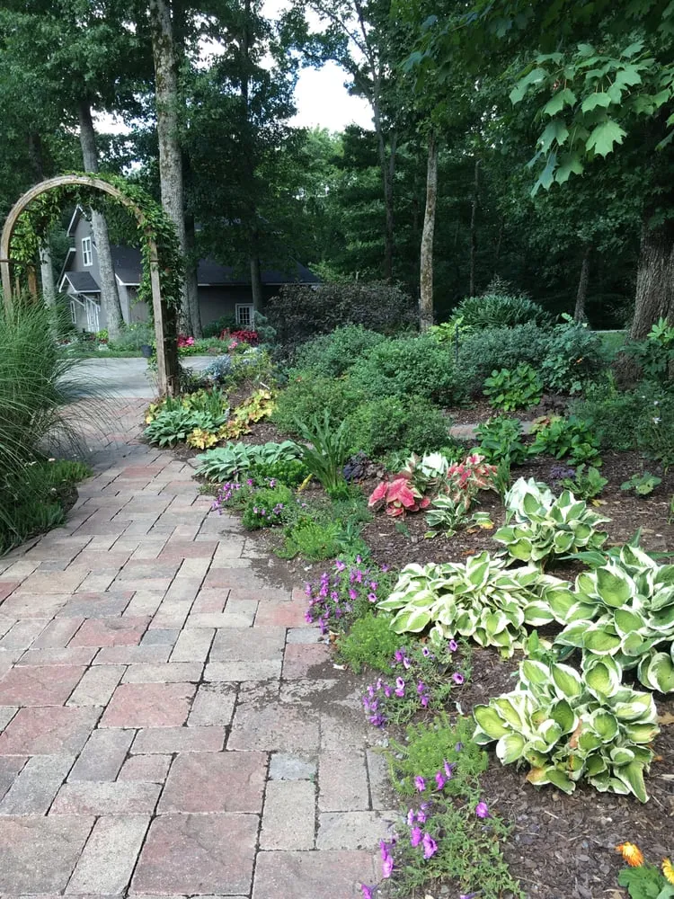 Expert lawn mowing service for homes in Nashville, TN by Spicer Landscape Design