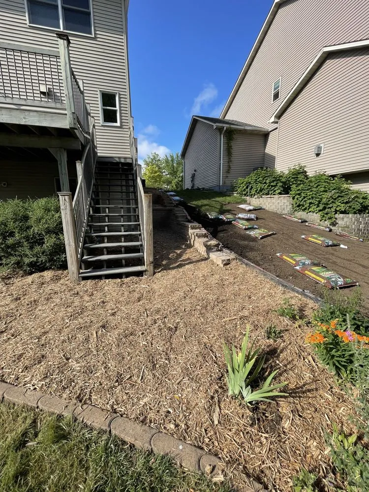 Affordable yard cleanup service for homes in Waconia, MN by Splitting Image Hardscapes