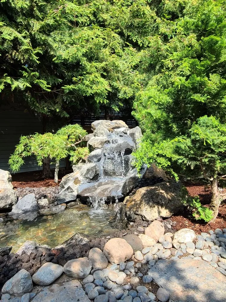 Professional lawn mowing service with custom design in Chattaroy, WA by Spokane DreamScapes