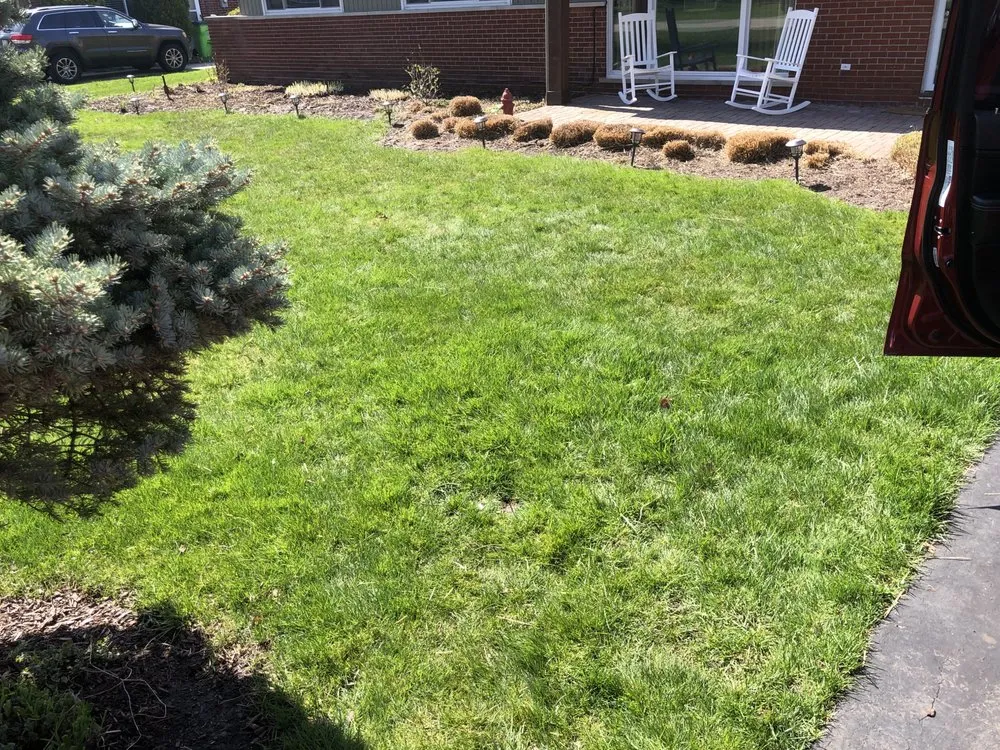 Top-rated lawn mowing service with custom design in Waterford, MI by Spooner Landscaping