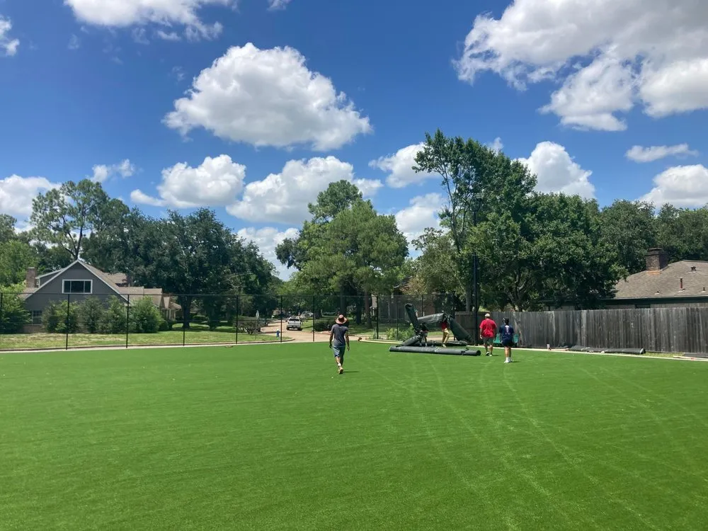 Professional lawn mowing service with custom design in Houston, TX by Sportscapers Construction