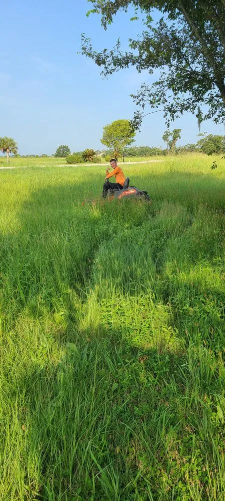 Custom lawn mowing service with custom design in Madisonville, LA by Sportsman’s Paradise Lawn Care
