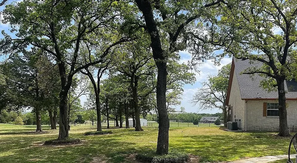 Expert garden landscaping for year-round maintenance in Aubrey, TX by Spot On Outdoor Services