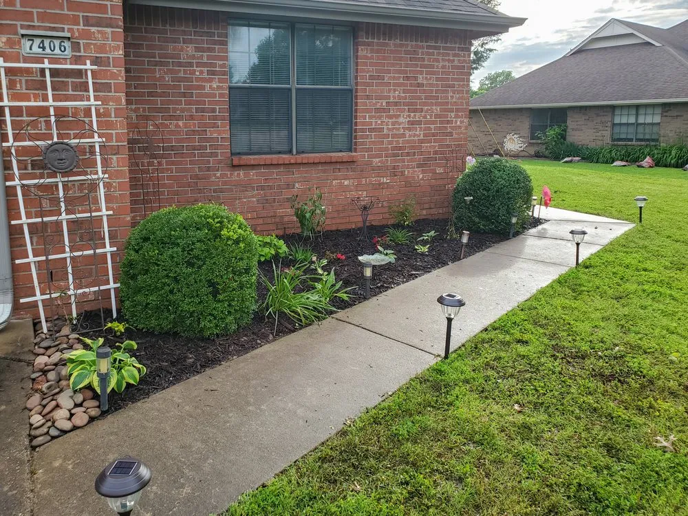Professional garden landscaping for outdoor upgrades in Collinsville, OK by Sprague's Kik'n Grass