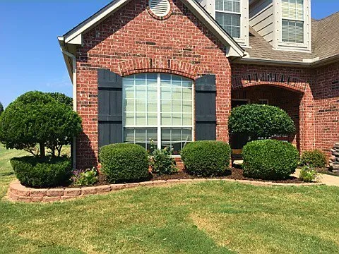 Affordable landscape installation with custom design across Collinsville, OK - Sprague's Kik'n Grass