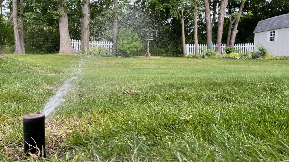 Custom residential landscaping for beautiful yards in Fenton, MI by Spray Master Irrigation