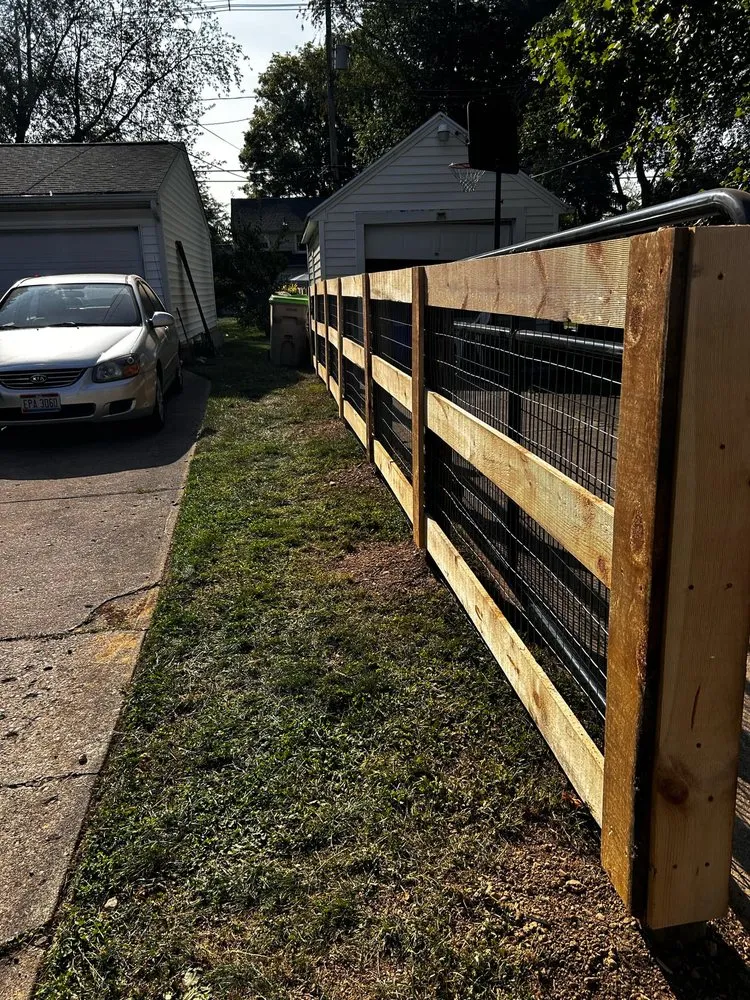 Trusted yard cleanup service with custom design in Springfield, OH by Spurs Plus Sprouts Fencing and Landscaping