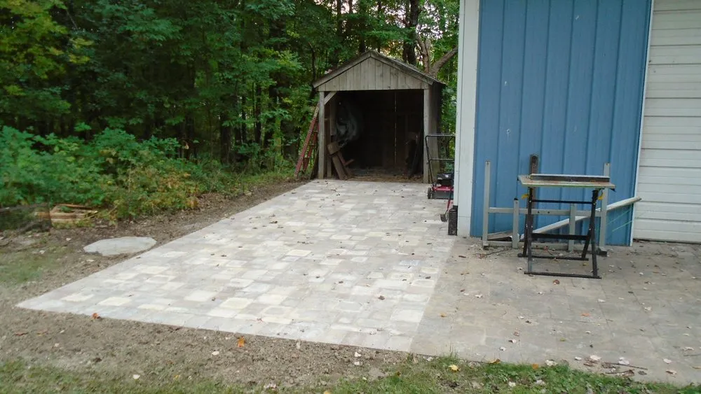 Expert yard cleanup service for year-round maintenance in Commerce Charter Township, MI by Squeals Landscaping