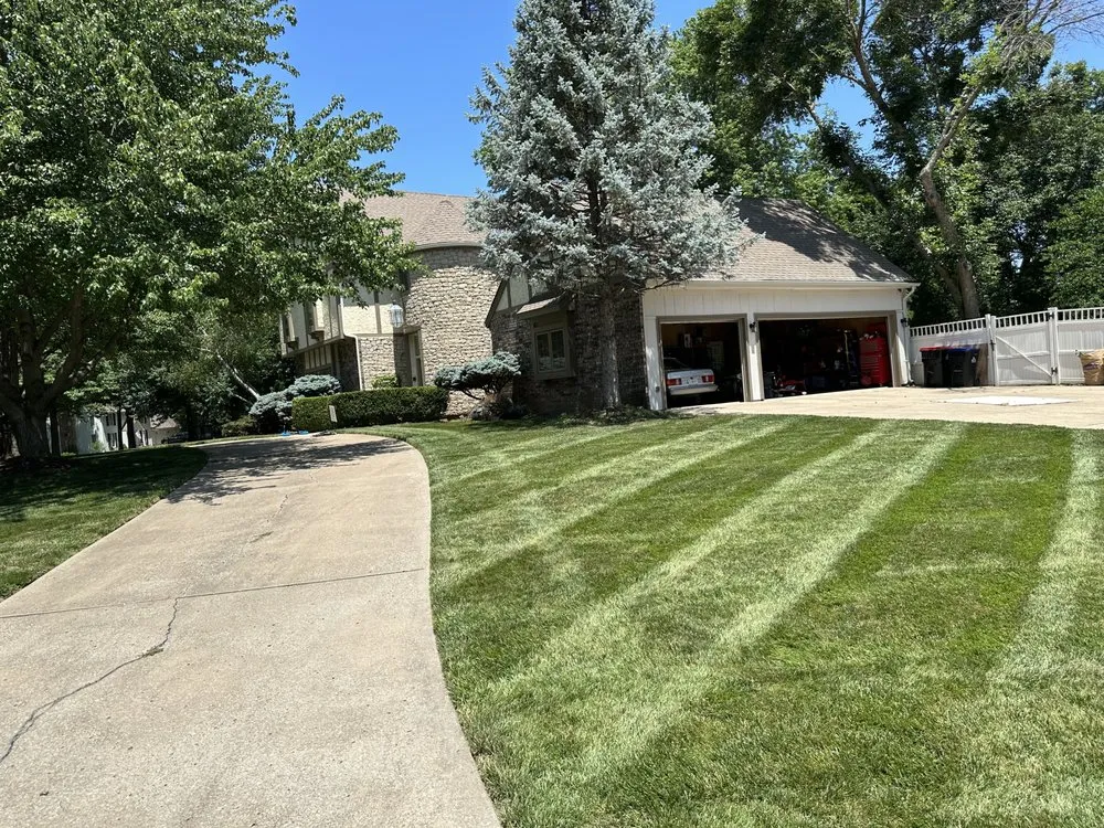 Top-rated yard maintenance with custom design in Blue Springs, MO by Squirt N' Turf Lawn Service