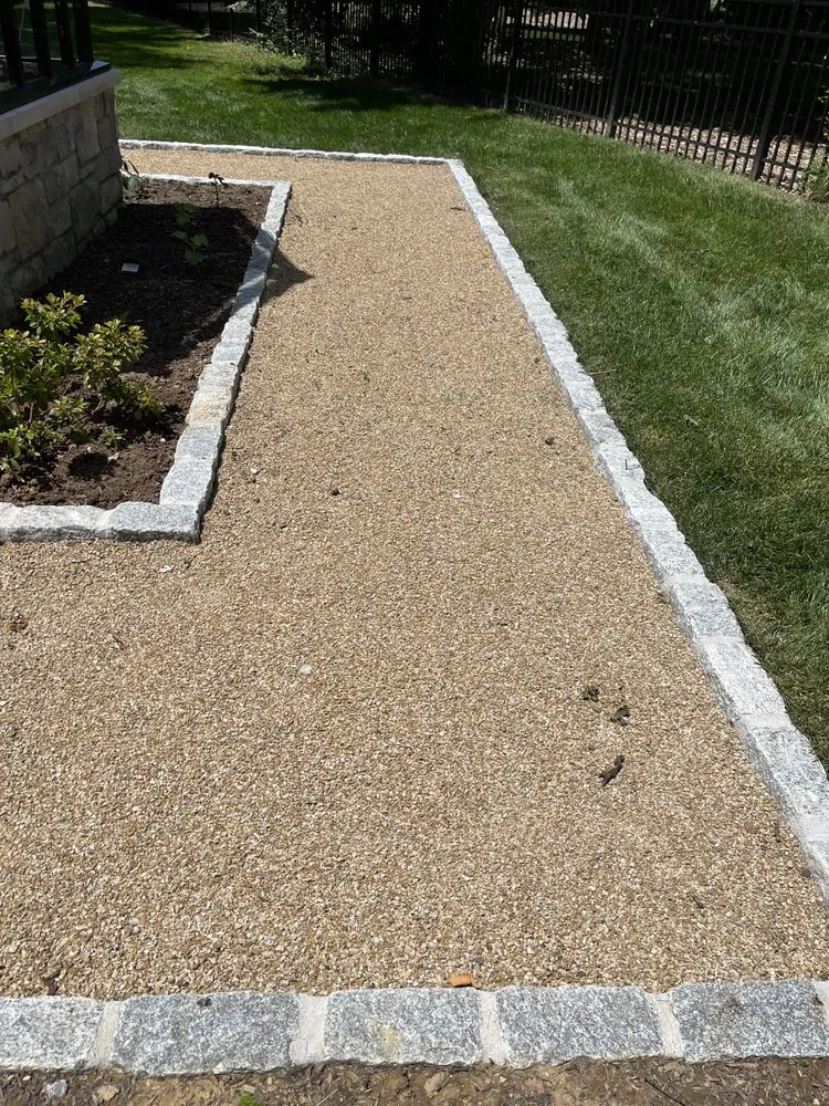 Custom landscape installation with custom design in Lyndon, KY by S&S Landscaping