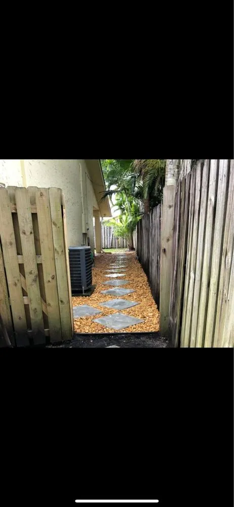 Professional yard maintenance with custom design in Lake Worth, FL by Sss Lawn Services