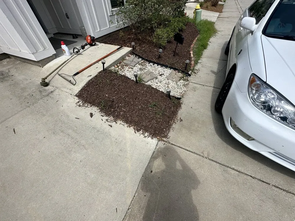 Professional landscape design for homes in Denham Springs, LA by St Angelo's Lawn Maintenance