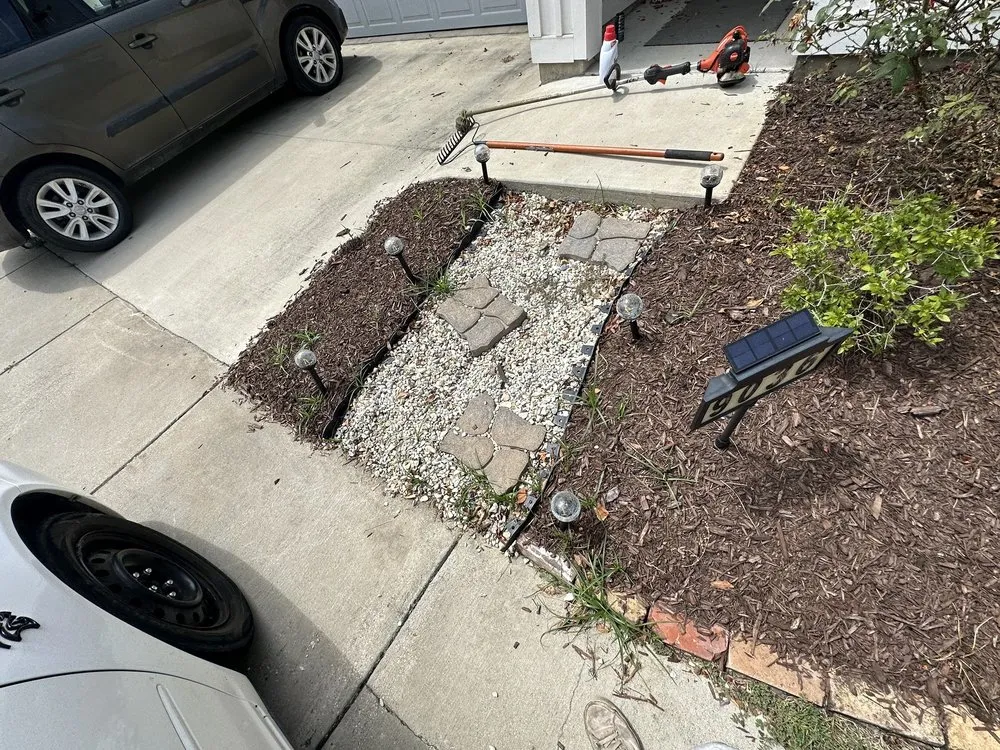 Professional landscape design for homes in Denham Springs, LA by St Angelo's Lawn Maintenance