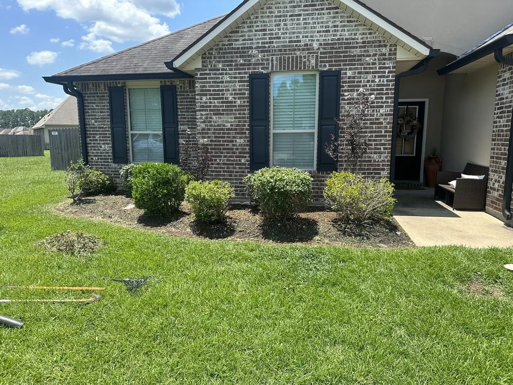 Custom landscape installation in Denham Springs, LA by St Angelo's Lawn Maintenance
