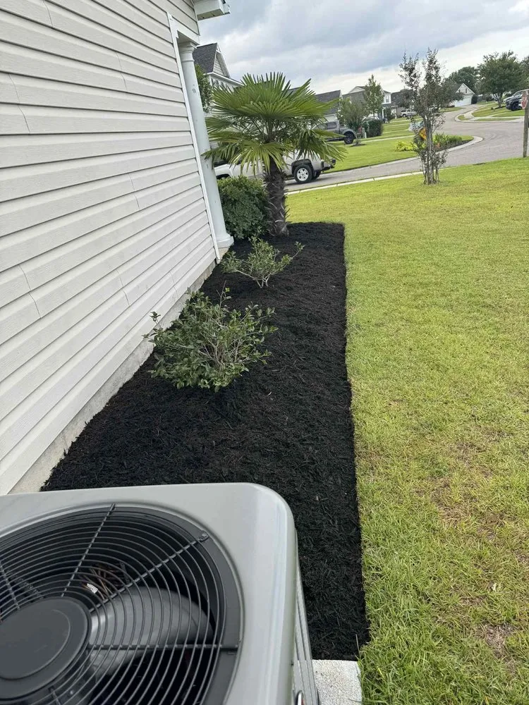 Custom landscape design with custom design across Wilmington, NC - St John’s Lawn & Landscape