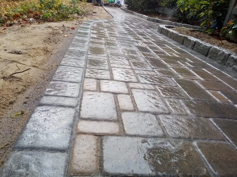 Expert landscape design for residential properties in Biddeford, ME by St onge and Sons