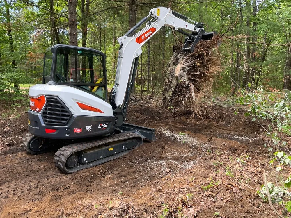 Custom landscaping services for year-round maintenance across Milford, NH - Stacy Outdoor Services