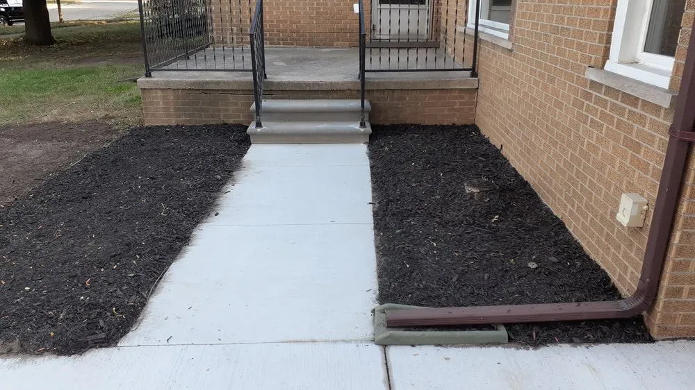 Professional landscape design for homes in Inkster, MI by Stallworth Lawn Care Trash Out And Demo