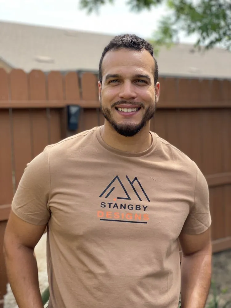 Professional lawn mowing service for residential properties in Fresno, CA by Stangby Designs