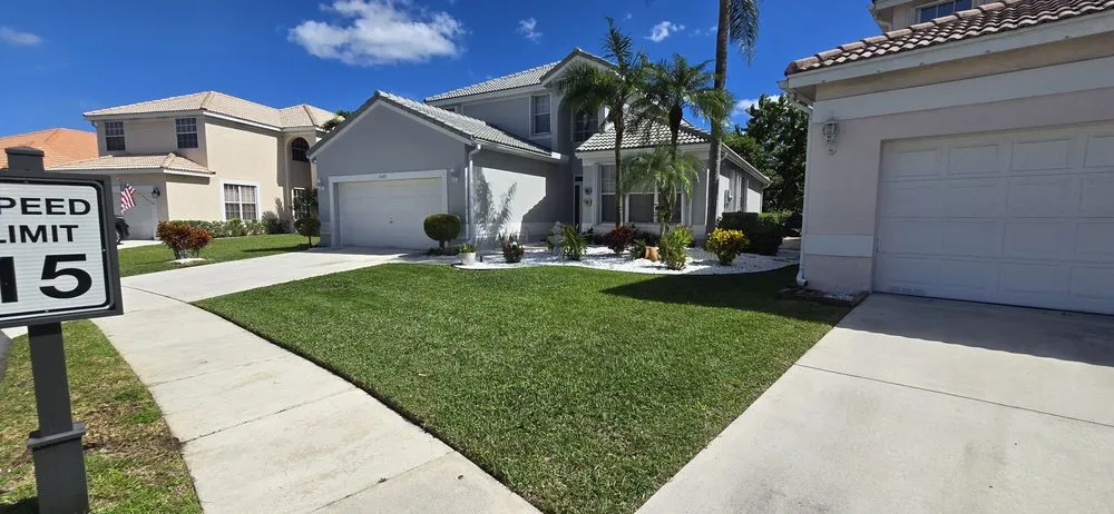 Professional lawn care service for homes across Hollywood, FL - Stanley Elias Lawn Care & Maintenance