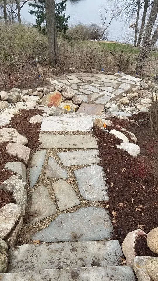 Custom landscape design for year-round maintenance across Hickory Corners, MI - Stap Brothers