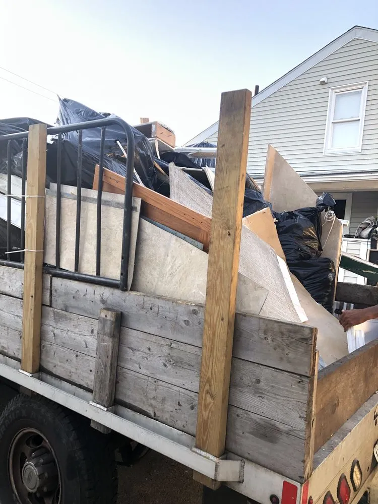 Custom lawn care service for homes in Cranston, RI by Star Landscape & Junk Removal