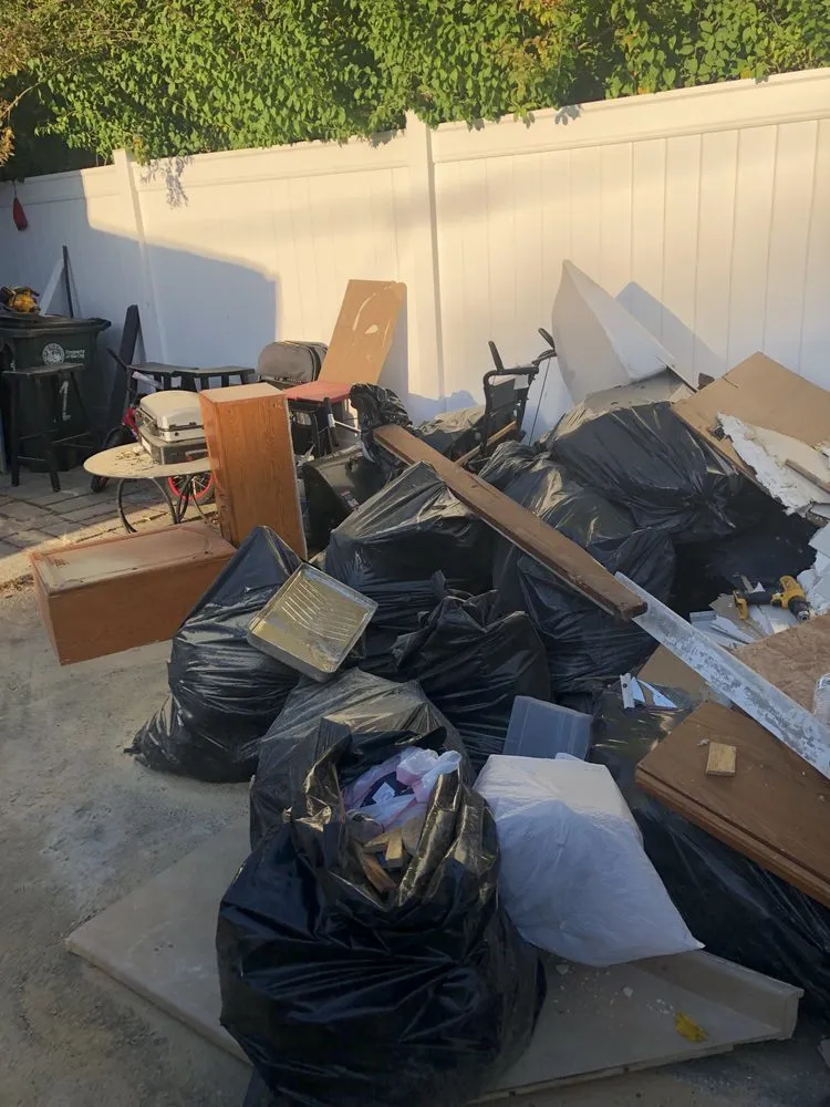 Affordable lawn mowing service with custom design in Cranston, RI by Star Landscape & Junk Removal