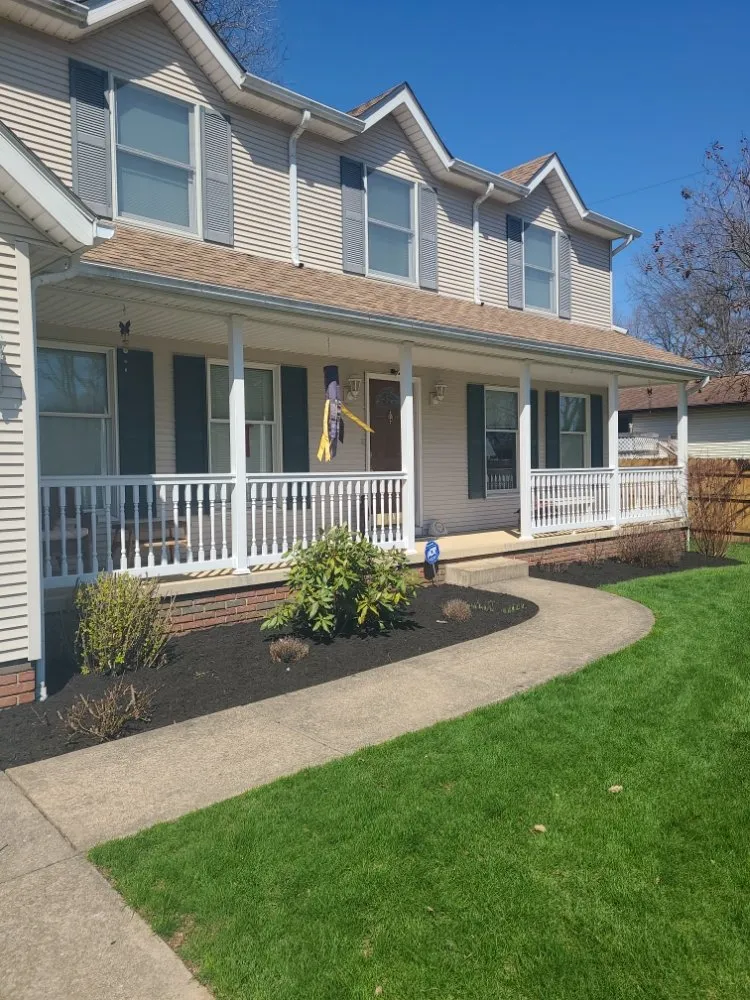 Expert lawn mowing service for year-round maintenance in Louisville, OH by StarkScapes