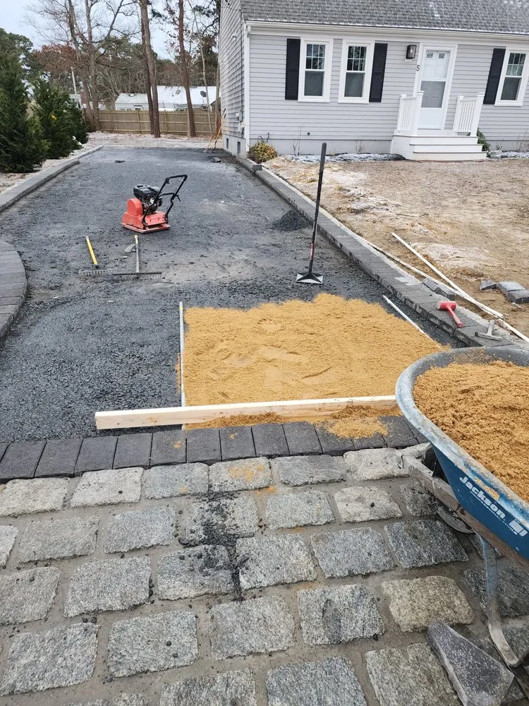 Custom landscape installation in Hyannis, MA by Starline landscaping