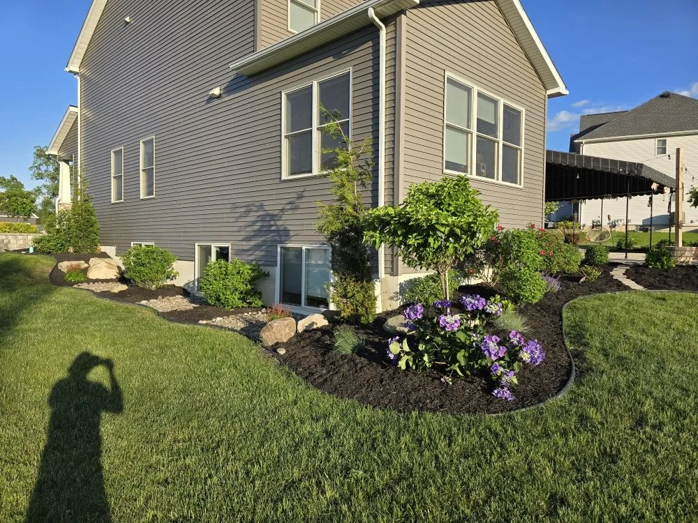 Professional landscape installation for year-round maintenance in Buffalo, NY by Starlite Snow Removal & Lawn Care