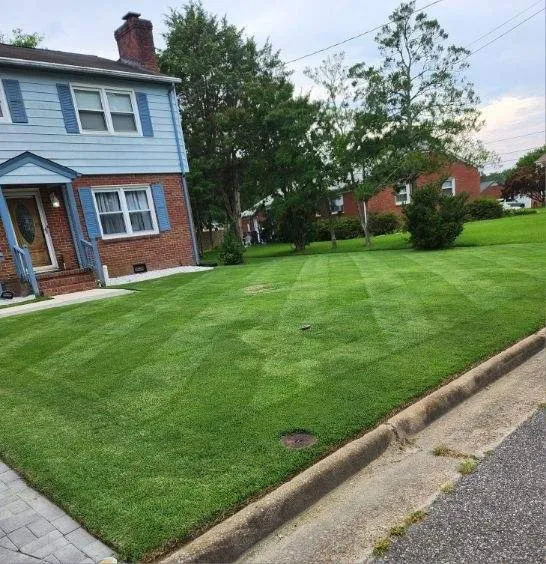 Custom landscape design in Newport News, VA by Stars & Stripes Lawn Care Services