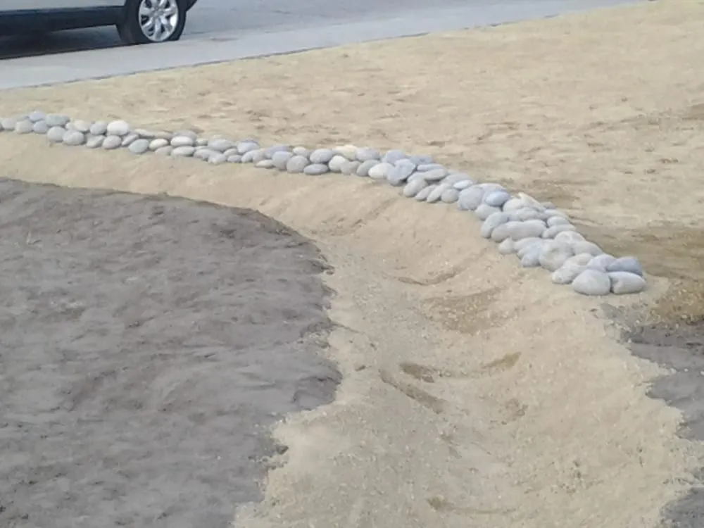 Professional lawn mowing service with custom design in Lompoc, CA by Starving Students Lawnscape