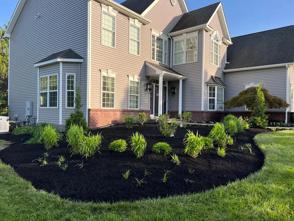 Affordable landscape design in Doylestown, PA by Status Mow