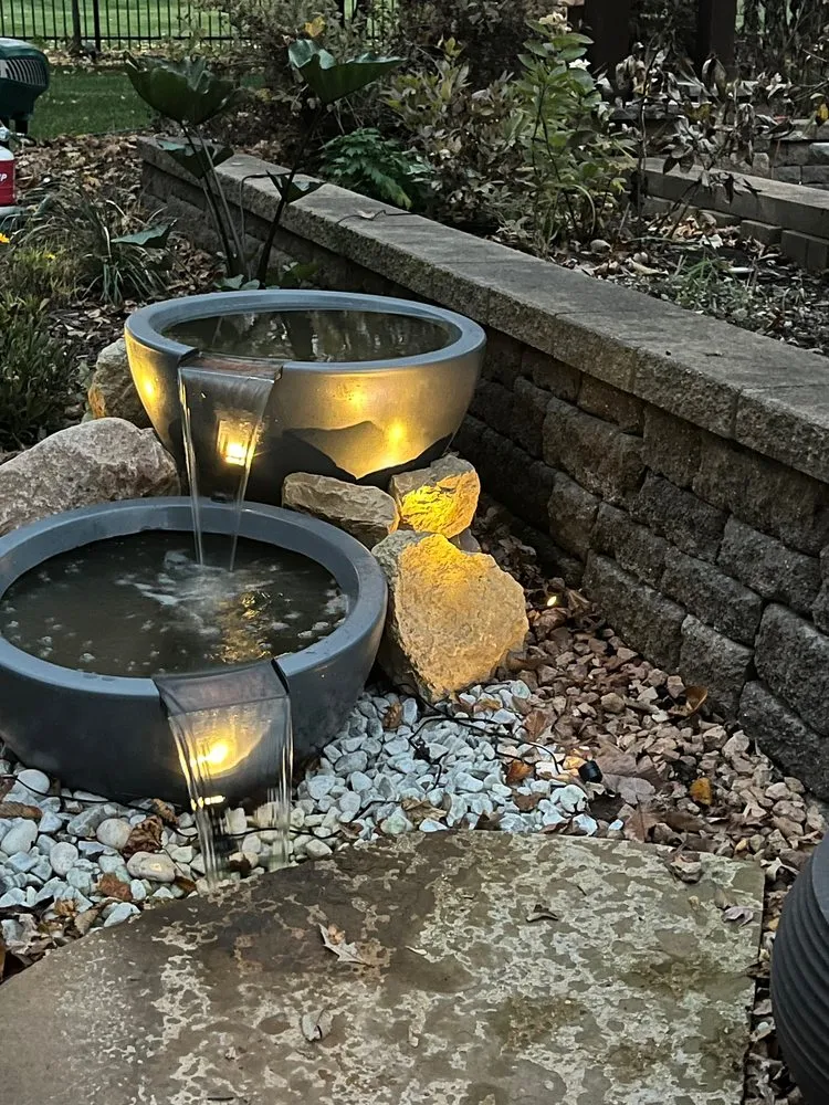 Professional lawn mowing service for outdoor upgrades in Lakeville, MN by StayCations Outdoor Design