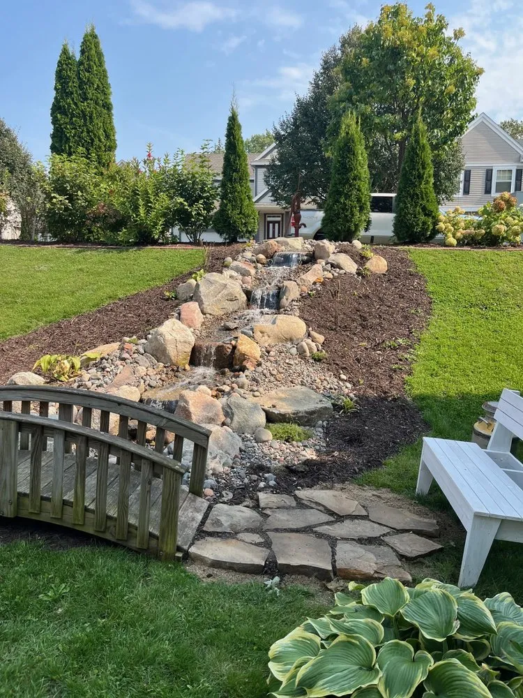 Affordable lawn care service in Lakeville, MN by StayCations Outdoor Design