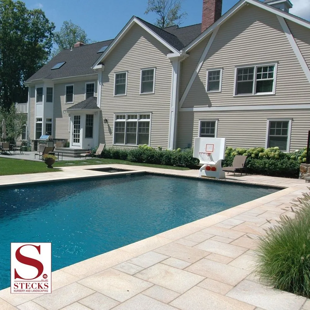 Expert yard maintenance with custom design across Bethel, CT - Stecks Nursery And Landscaping