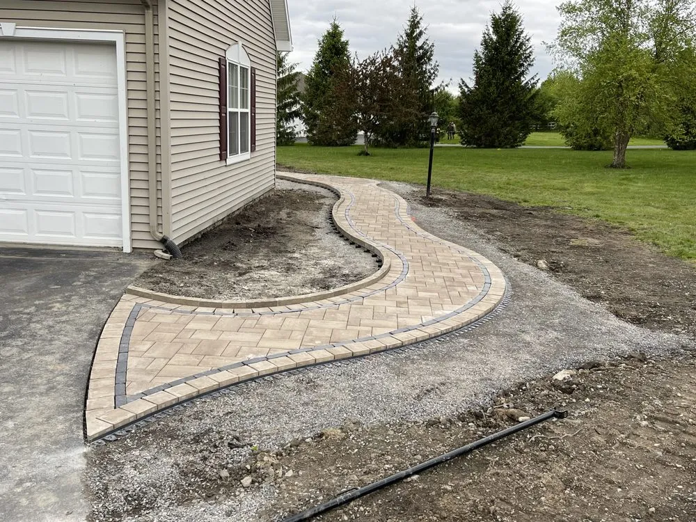 Expert lawn mowing service for residential properties across Kirkville, NY - Stein Design & Build