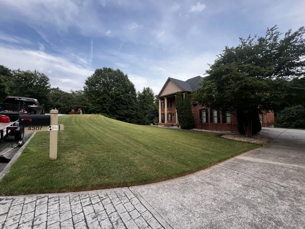 Custom yard maintenance with custom design in Dallas, GA by Stellar Yard Life