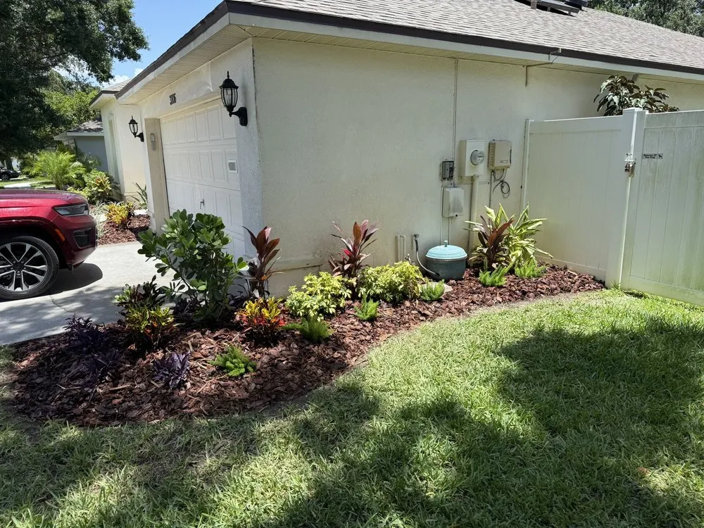 Custom residential landscaping with custom design in Brandon, FL by Stem And Stone Landscaping
