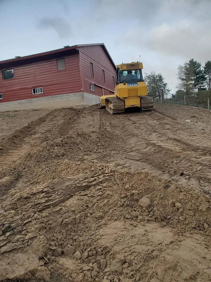 Professional yard maintenance with custom design in Augusta, WI by Stensen Excavating