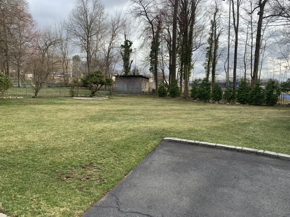 Affordable yard maintenance for homes across Caldwell, NJ - Step by Step Green Landscaping