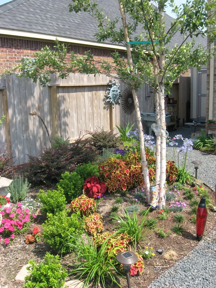 Professional lawn mowing service for residential properties in Houston, TX by Sterling Design & Landscape Resources