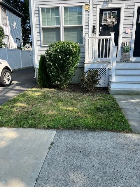 Expert lawn mowing service with custom design in Lynn, MA by Stevens Landscaping and Tree Service